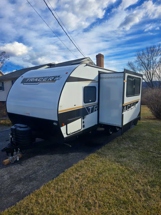 Spacious Tracer LE travel trailer with slide-out, perfect for your next RV rental adventure.. Prime Time Tracer LE 2024