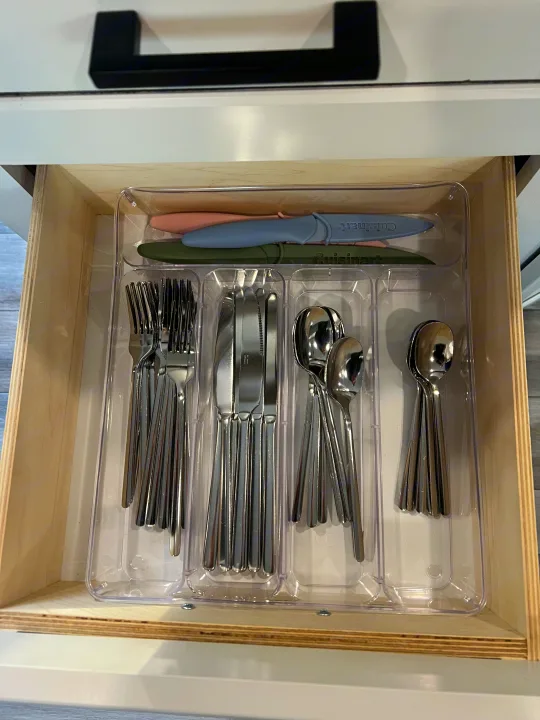 RV rental kitchen drawer with organized forks, knives, spoons & Cuisinart knives in a clear tray.. Jayco Jayflight 324bds 2025
