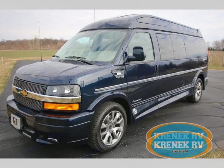 Premium dark blue Chevrolet Express conversion van, perfect for your next RV rental or comfortable travel.. Chevrolet Explorer Luxury Van 9 Passenger 2023