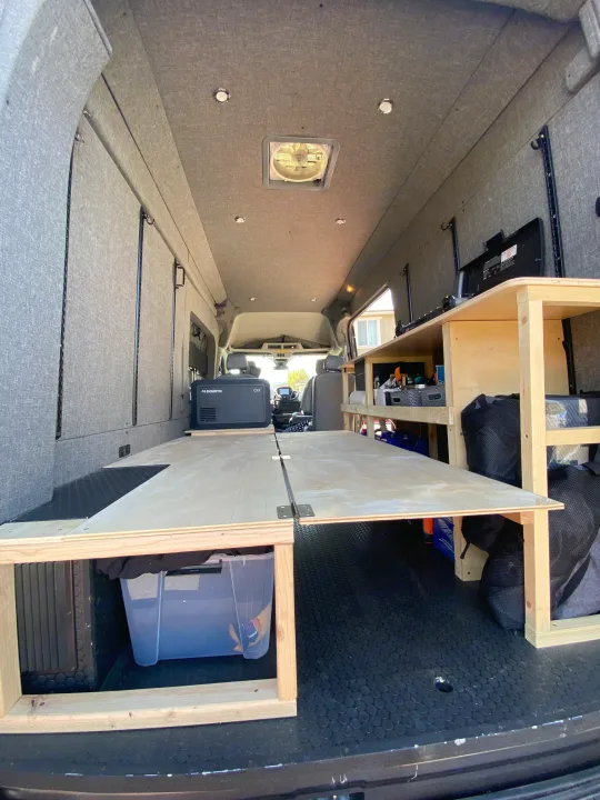 Explore this custom van conversion! Perfect for an **rv rental**, featuring a foldable bed, Dometic fridge, and ample storage.. Ford Transit 2016