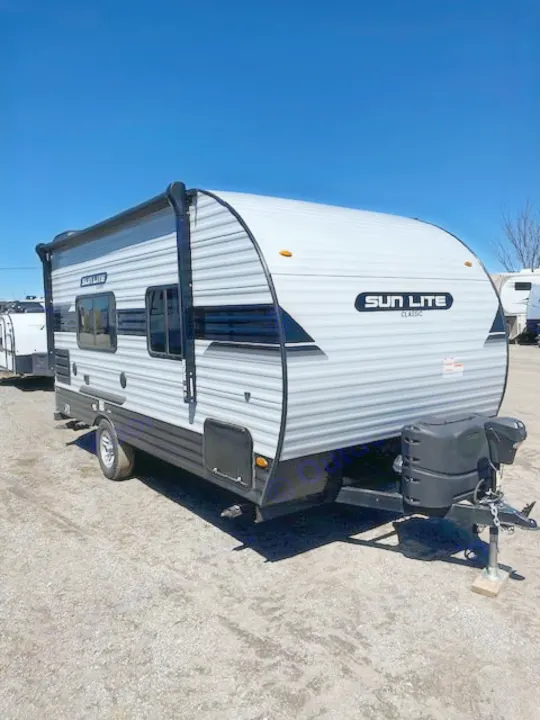Sun Lite Classic RV rental. Light gray travel trailer for your next adventure or camping trip.. Sunset Park RV Sun Lite 2021