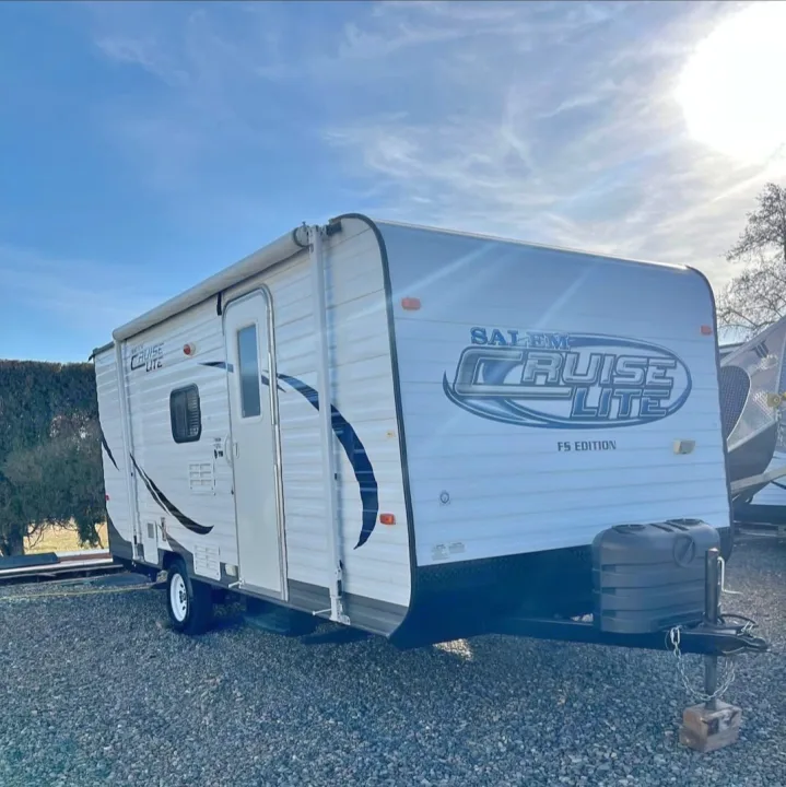 White Salem Cruise Lite travel trailer, great for RV rental adventures. Single axle, compact and ready for your trips.. Forest River Salem Cruise Lite 2013