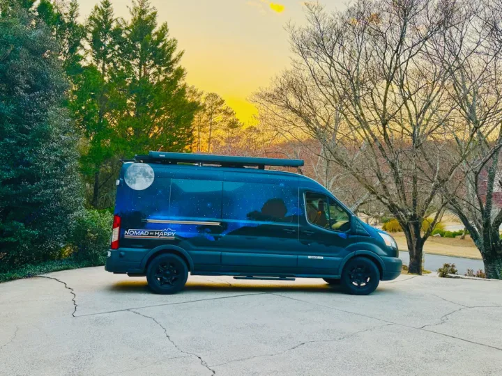Experience freedom with this custom RV rental van, painted with a stunning starry night & moon design.. Ford Transit 2017