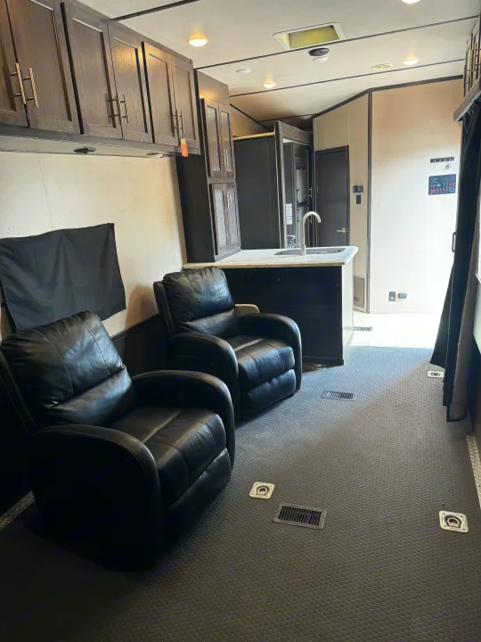 RV rental: Interior features two recliners, a full kitchen, and a durable rubberized floor with tie-downs.. Forest River Nitro Xlr 2017