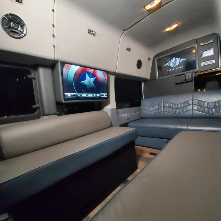 This luxury RV rental offers a spacious interior with Captain America on screen, plush two-tone seating, and custom lighting.. Ford Custom Transit 2017