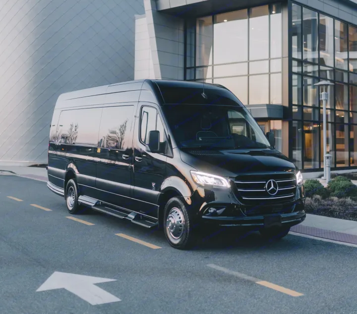 Black Mercedes-Benz Sprinter luxury van, perfect for RV rental or executive transport, parked on asphalt near a modern building.. Ultimate Toys Ultimate Freedom XL 2025
