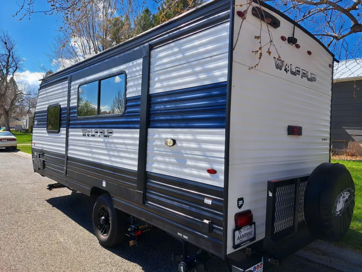 Spacious white and black Wolf Pup travel trailer. Forest River Cherokee Wolf Pup 2023