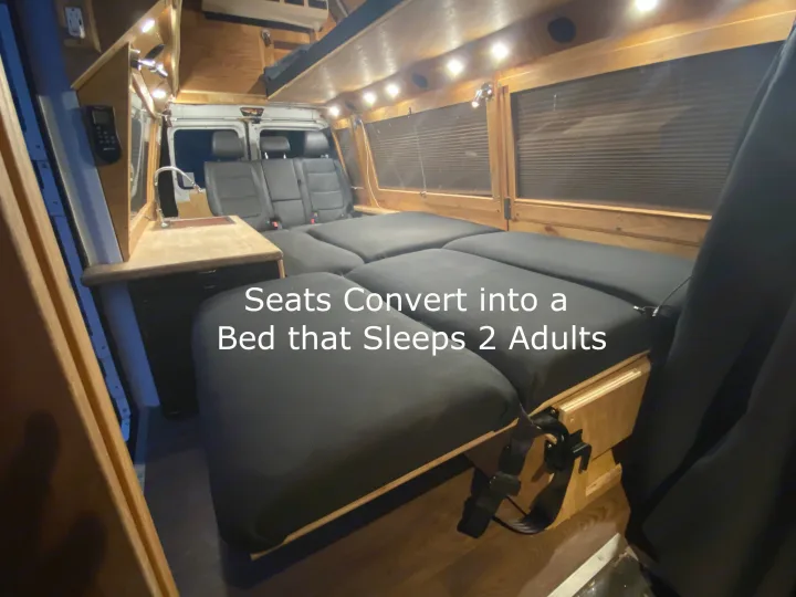 This cozy RV rental features a van interior with seats converting into a spacious bed for 2 adults, complete with a kitchenette.. Ford Econoline 2011