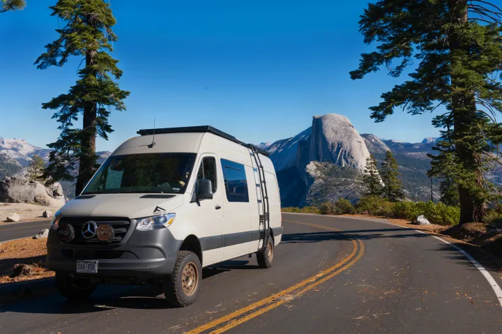 Adventure-ready RV rental van by Half Dome in scenic Yosemite National Park. Ideal for travel.. Mercedes-Benz Sprinter 2024