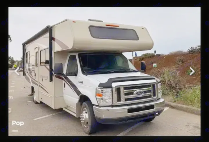 White Coachmen Leprechaun Class C rv rental, on a Ford chassis, parked and ready to go.. Coachman Leprechaun 2020