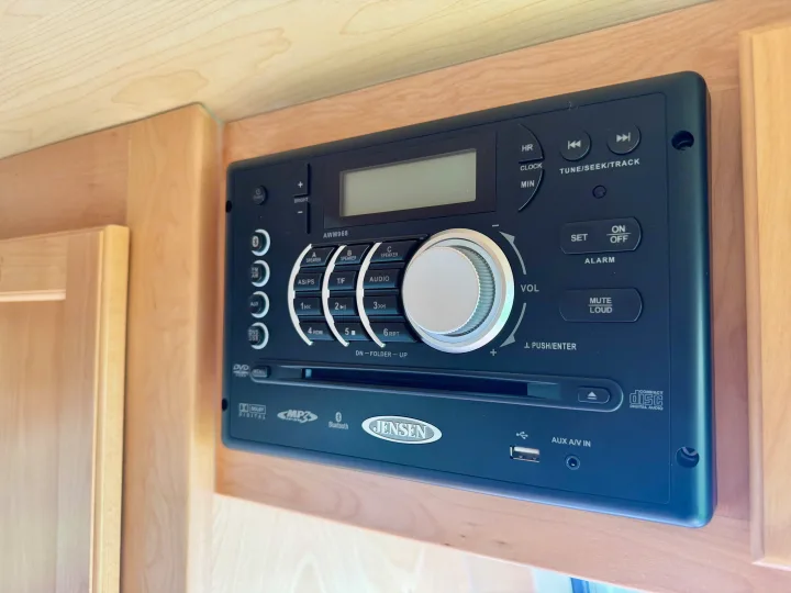 This RV rental features a Jensen multimedia system for entertainment, including DVD, Bluetooth, and various audio inputs.. Pleasant Valley/NuCamp T@B 2016