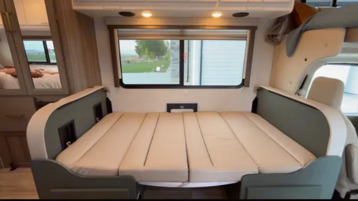 Experience comfort in this RV rental's convertible bed, ideal for restful nights on the road.. Thor Motor Coach Eddie Bauer 21EBF 2025