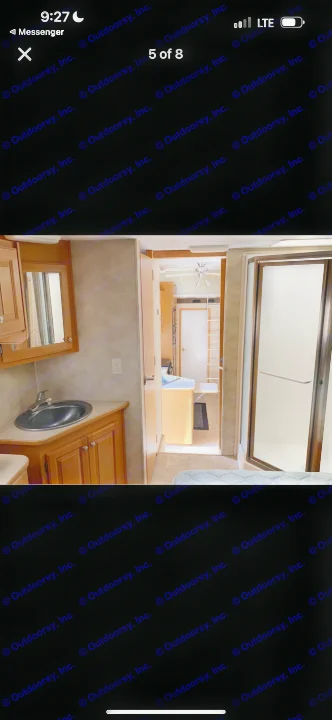 RV rental interior featuring a compact bathroom with vanity & shower, leading to the bedroom.. Heartland RVs Cyclone Toy Hauler 2008
