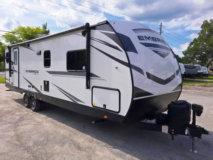 This sleek Embrace Ultra-Lite travel trailer, ideal for rv rental, offers lightweight camping adventures.. Cruiser Embrace EL26RB 2024