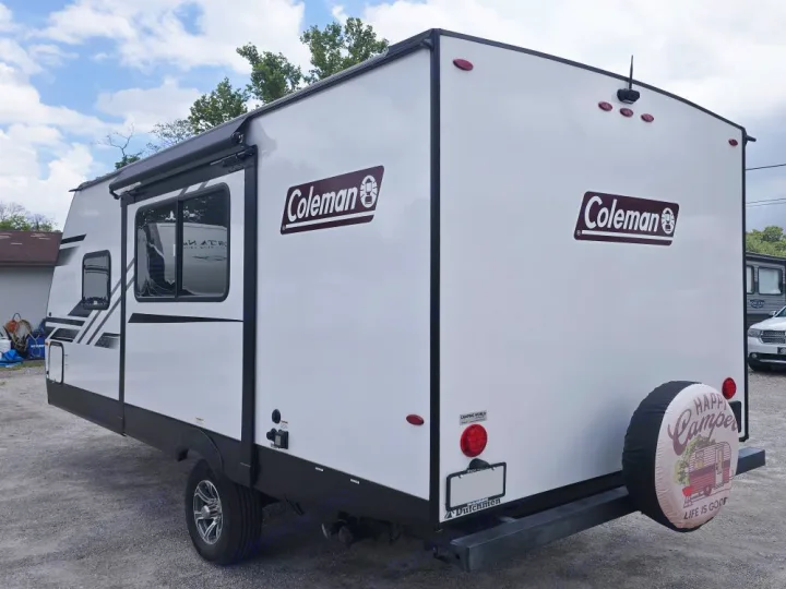 White Coleman travel trailer, ideal for your next RV rental adventure. Ready for camping trips and outdoor fun!. Coleman 1855RB 2022