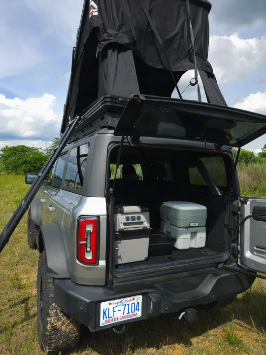 This RV rental Bronco features a rooftop tent, portable fridge, & toilet for overlanding adventures.. Ford Bronco Outer Banks 2022