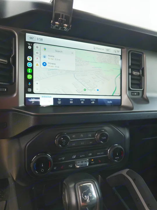 Ford Bronco interior: Android Auto navigation to "Sovereign Van", suggesting an RV rental pickup. Modern infotainment.. Ford Bronco Outer Banks 2022