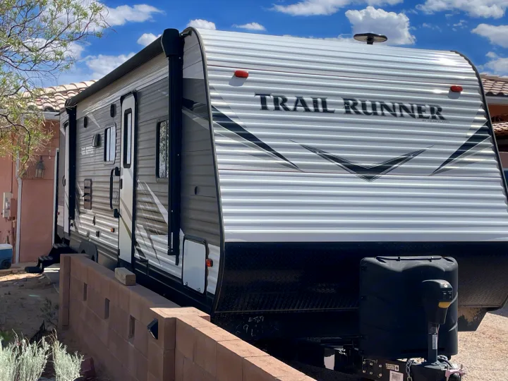 Spacious Trail Runner travel trailer, perfect for your next rv rental adventure under blue skies. Ideal for camping.. Heartland RVs Trail Runner 2019
