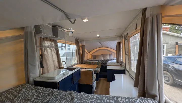 Discover this cozy pop-up camper rv rental: a compact home with kitchen, dinette, and comfy sleeping areas.. Coachmen Clipper 2008