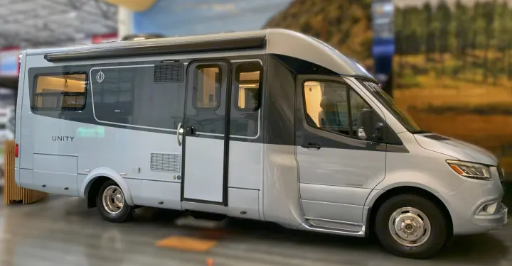 Silver & gray Leisure Travel Vans Unity RV rental. This modern motorhome offers sleek design for comfortable road adventures.. Leisure Travel Vans Unity 2022