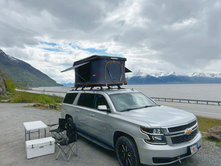 RV rental alternative: This SUV with a rooftop tent is set for scenic Alaskan lakeside camping & mountain adventure.. Chevrolet Suburban 2015