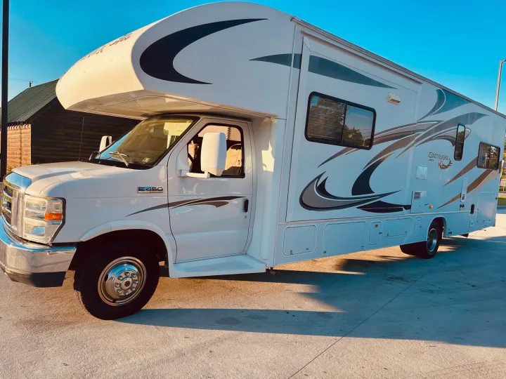 Bright white Jayco Greyhawk Class C motorhome, ready for your next trip. Ideal for an rv rental adventure.. Jayco Greyhawk 2011