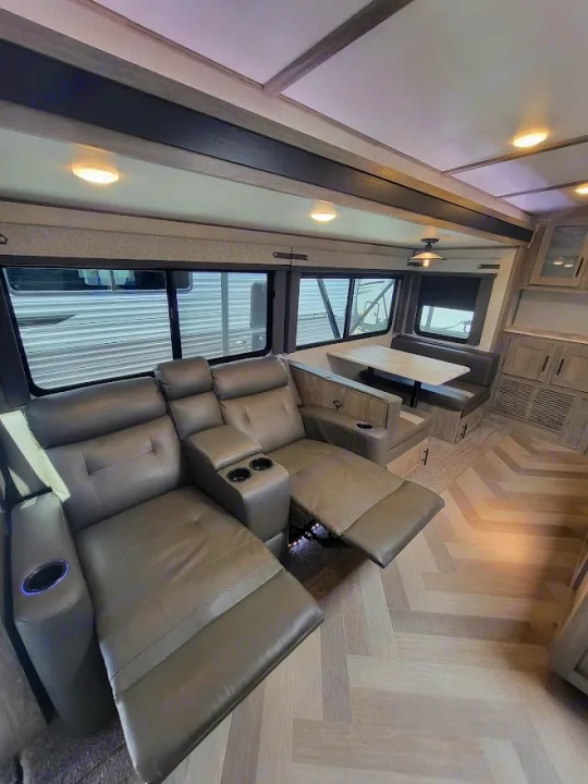 Step into comfort with this RV rental! Enjoy power recliners, a bright dinette, and modern interior design with herringbone flooring.. Forest River Salem Hemisphere 2021