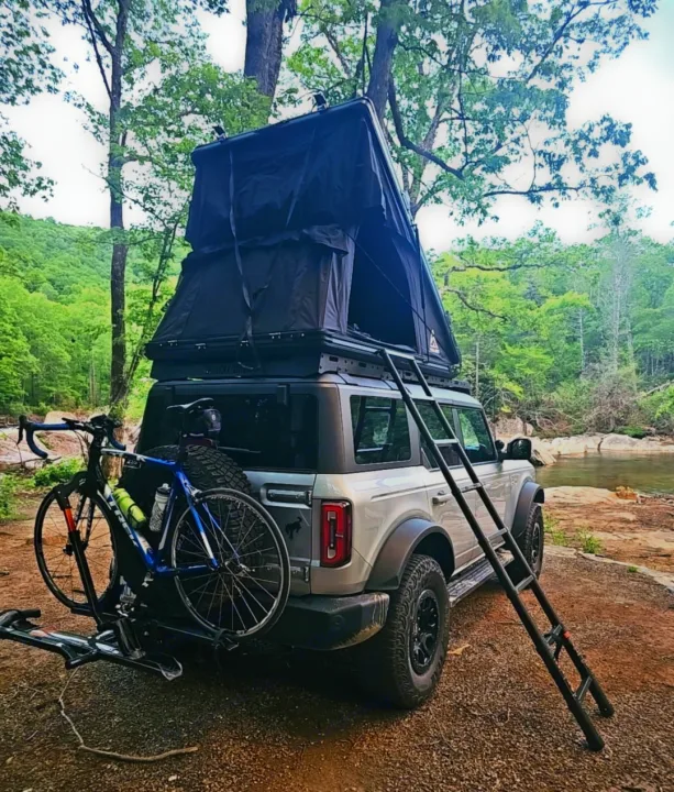 Adventure-ready Bronco with rooftop tent, ladder & bike rack. Enjoy off-grid camping like an RV rental!. Ford Bronco Outer Banks 2022