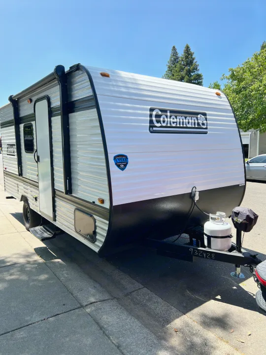White Coleman travel trailer, perfect for your next RV rental. Features a front propane tank and a 3-year structural warranty.. Coleman Lantern 17B 2025