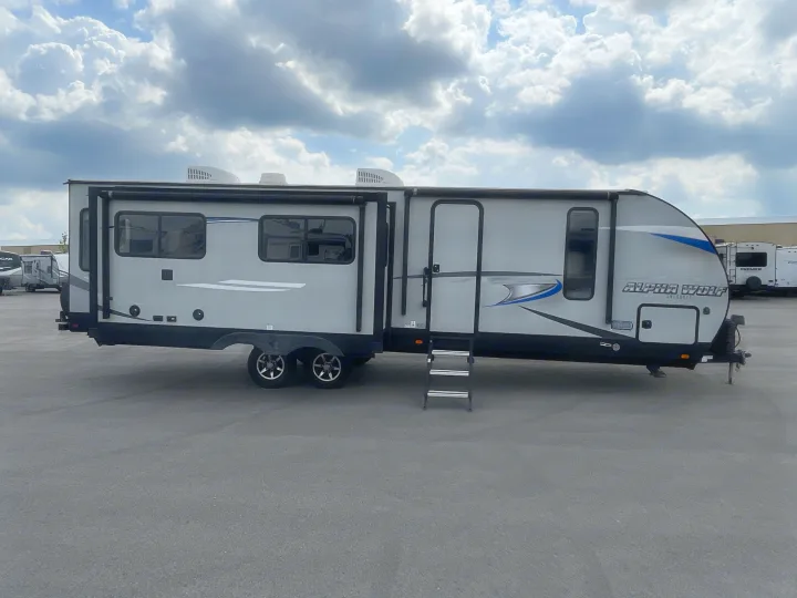 This Alpha Wolf travel trailer is a perfect RV rental option, featuring a spacious interior with an extended slide-out.. Forest River Cherokee Alpha Wolf 2020