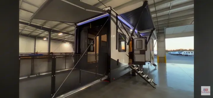 Spacious toy hauler RV for your next rv rental adventure, featuring expanded deck & awning for outdoor living.. Heartland RVs Road Warrior Toy Hauler 2022