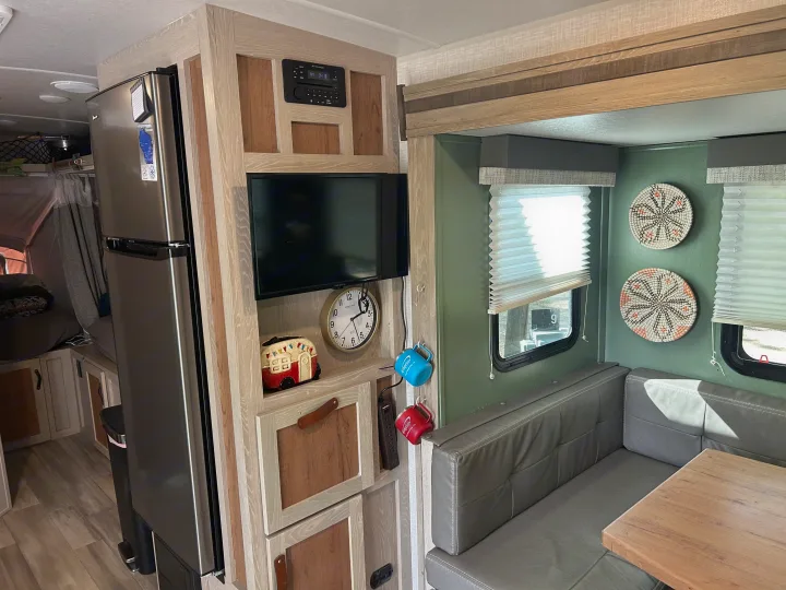 Step inside this modern RV rental! Features include a well-equipped kitchen, dinette, and entertainment setup.. Forest River Flagstaff Shamrock 2022