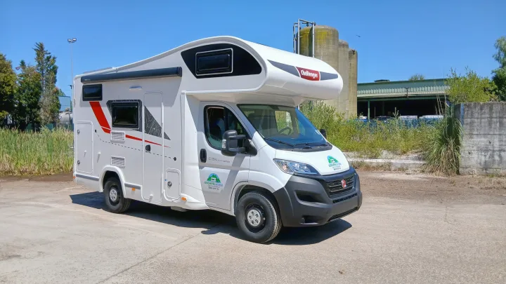 A white Challenger campervan rv rental from Escapacantabria, parked on concrete under a clear blue sky.. Challenger C194 START EDITION 2025