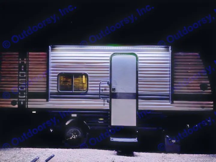 An RV rental at night, its side and entry brightly lit by integrated LED lights, ideal for night setup.. Keystone RV Hideout Sport 2024