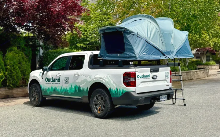 White Ford Maverick adventure vehicle from Outland Rentals, equipped with a Thule rooftop tent. Ideal for your next RV rental camping trip.. Ford Maverick 2025