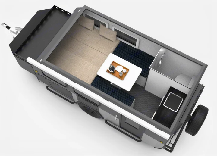 Overhead view of an RV rental interior, revealing its compact layout: bed, dining area, kitchen, and wet bath for travel.. Zoomies Campers Eagle’s Nest 2025