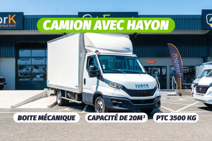 White commercial box truck with tailgate, 20m³ capacity, manual gearbox, ready for rental. Often found at vehicle rental businesses, similar to RV rental outlets.. IVECO 35C16 2023