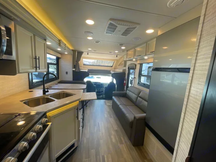 Get ready for adventure! Inside this RV rental: a well-equipped kitchen, cozy living area, and fridge. Spacious and modern.. Jayco Greyhawk 2026