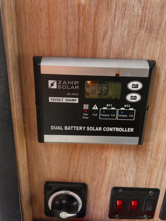 This Zamp Solar ZS-30AD dual battery solar controller, common in an RV rental, indicating active battery charging for off-grid use.. Forester Forester Motorhome 2020