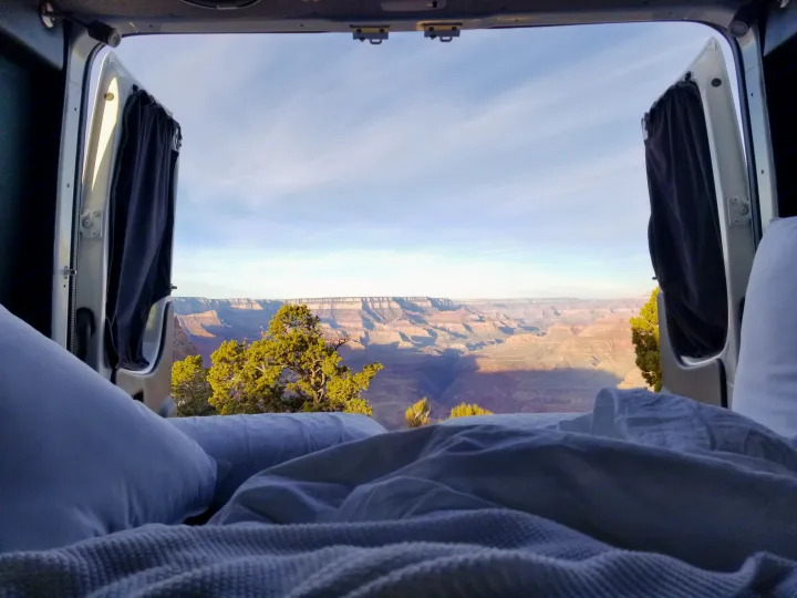Waking up to the Grand Canyon! View from a cozy RV rental bed with open doors. Epic nature experience.. Sportsmobile Regular Body 4X4 2017