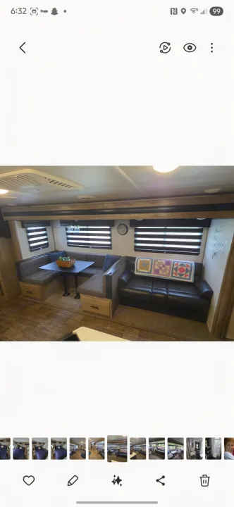 Step inside this RV rental: U-shaped dinette, comfy sofa, and practical living space with wood-look floors & blinds for travel.. Forest River Cherokee Alpha Wolf 2021