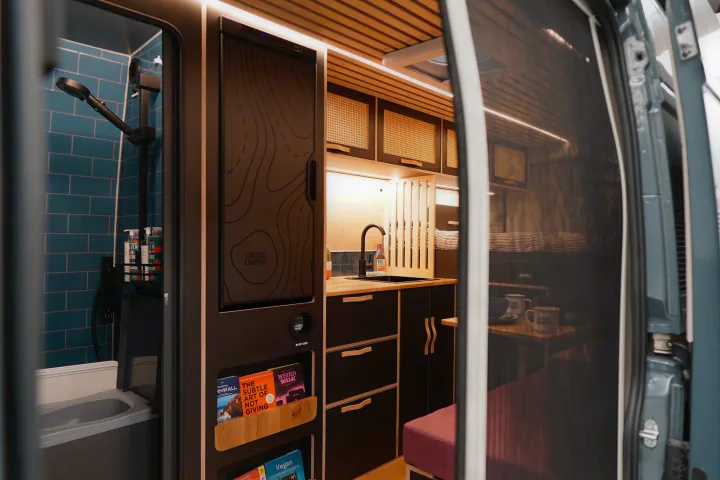 Stylish rv rental campervan interior: modern shower, equipped kitchen, and cozy sleeping area for comfortable mobile living adventures.. Citroen Relay L4H2 2025