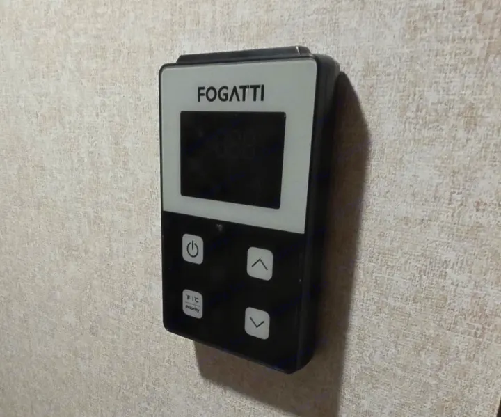 A FOGATTI digital control panel for a heater or AC, common in an RV rental. Shows power, up/down, and F/C buttons.. Jayco Jay Flight SLX 2018