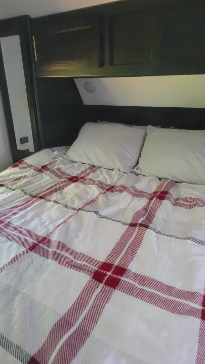 Queen bed in the bedroom. . Forest River Cherokee 2022