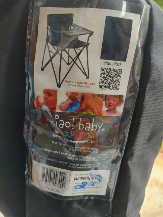 Packaging for a black Ciao! baby portable high chair (Model HB 2000), ideal baby gear for RV rental adventures or travel.. Palomino Puma 26RLS 2022