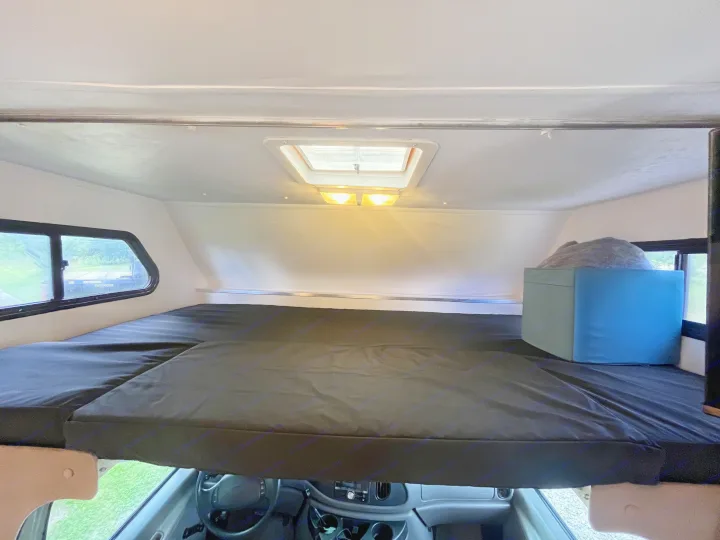 Spacious RV rental overhead bunk bed with skylight and windows.. Gulf Stream Ultra 1998