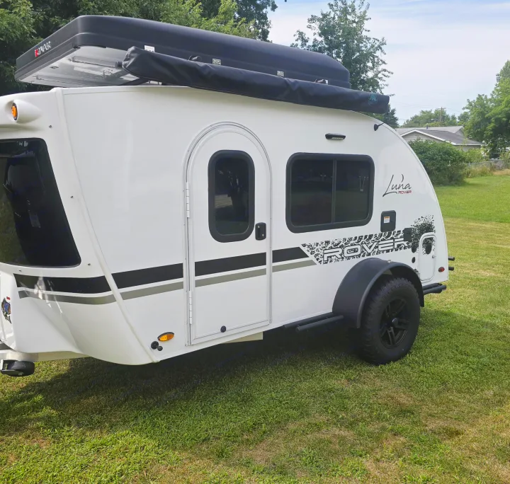White Luna Rover teardrop camper, a perfect RV rental for memorable camping and travel.. InTech RV Luna 2023