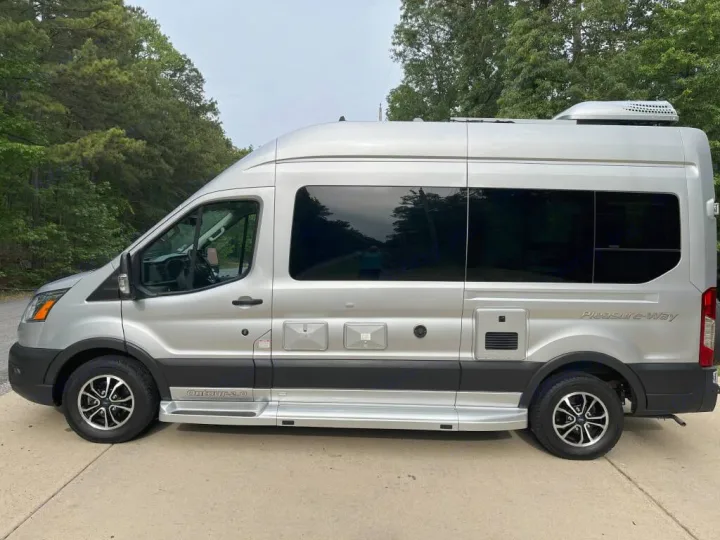 Silver Pleasure-Way Ontour 2.0 camper van, perfect for an rv rental road trip adventure.. Pleasure-Way Pleasure-Way Class B 2023