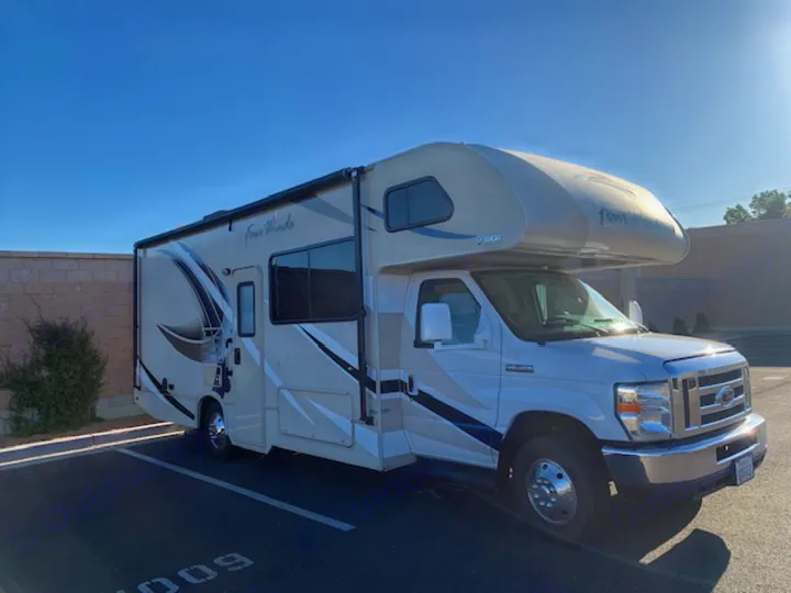 Class C Thor Four Winds RV rental, parked and ready for your next road trip adventure.. Thor Four Winds 2017