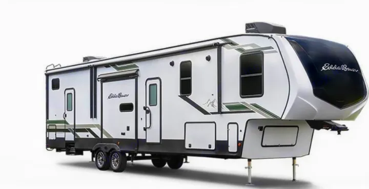 Large white Eddie Bauer fifth-wheel RV. An excellent rv rental option for spacious and comfortable camper travel.. Keystone RV Eddie Bauer Signature 360LF 2024